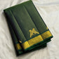 Deep Forest Green Kanchipuram saree with handwoven Kili zari motifs.