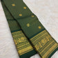 Deep green Kanjeevaram saree with ornate gold border
