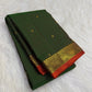 Deep forest green Pure Silk Kanchipuram saree with small gold zari buttas and a traditional Yaanai border.