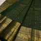 Traditional Annam motifs in framed gold zari panels on Deep Forest Green Kanchipuram silk