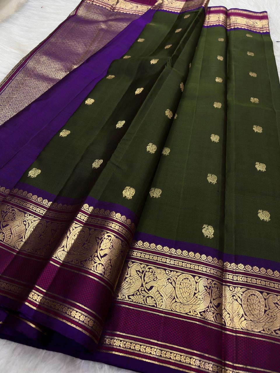 Deep Forest Green Pure Silk Kanjivaram Butta saree with Royal Purple zari border