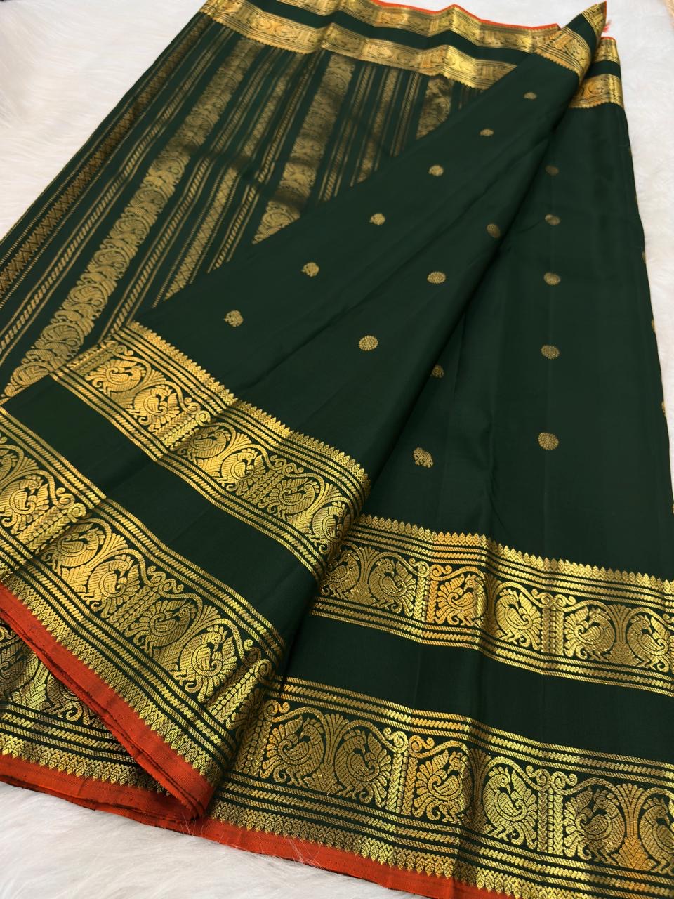 Deep Forest Green Handwoven Pure Silk Kanchipuram Saree with Rettapet Mayil Zari Border and Orange-Red Selvedge