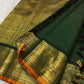 Deep Forest Green Pure Silk Kanchi Pattu Zari Kattam saree with gold medallion buttas and Antique Gold border.
