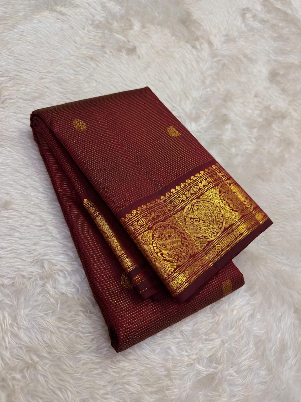Deep Garnet Maroon Handwoven Pure Silk Kanchi Pattu Vairaoosi Saree with Gold Zari Buttas and Traditional Medallion Border