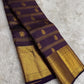 Thick Varisaipet border in dense gold zari on deep grape purple Kanchi Pattu saree