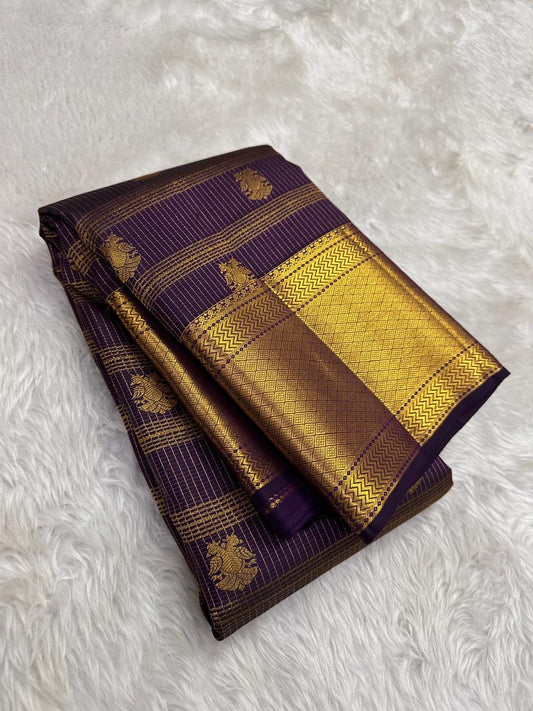 Close view of Zari Kattam body showing fine gold grid and Gandaberunda Butta on deep grape purple silk