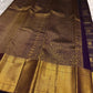 Gold zari Varisaipet pallu with Gandaberunda detail on deep grape purple Kanchi Pattu