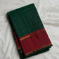 Open saree view highlighting the evenly spaced gold check grid across Deep Forest Green silk