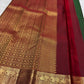 Deep Green handwoven Pure Silk Kanchipuram saree showing the full body and contrast zari border.