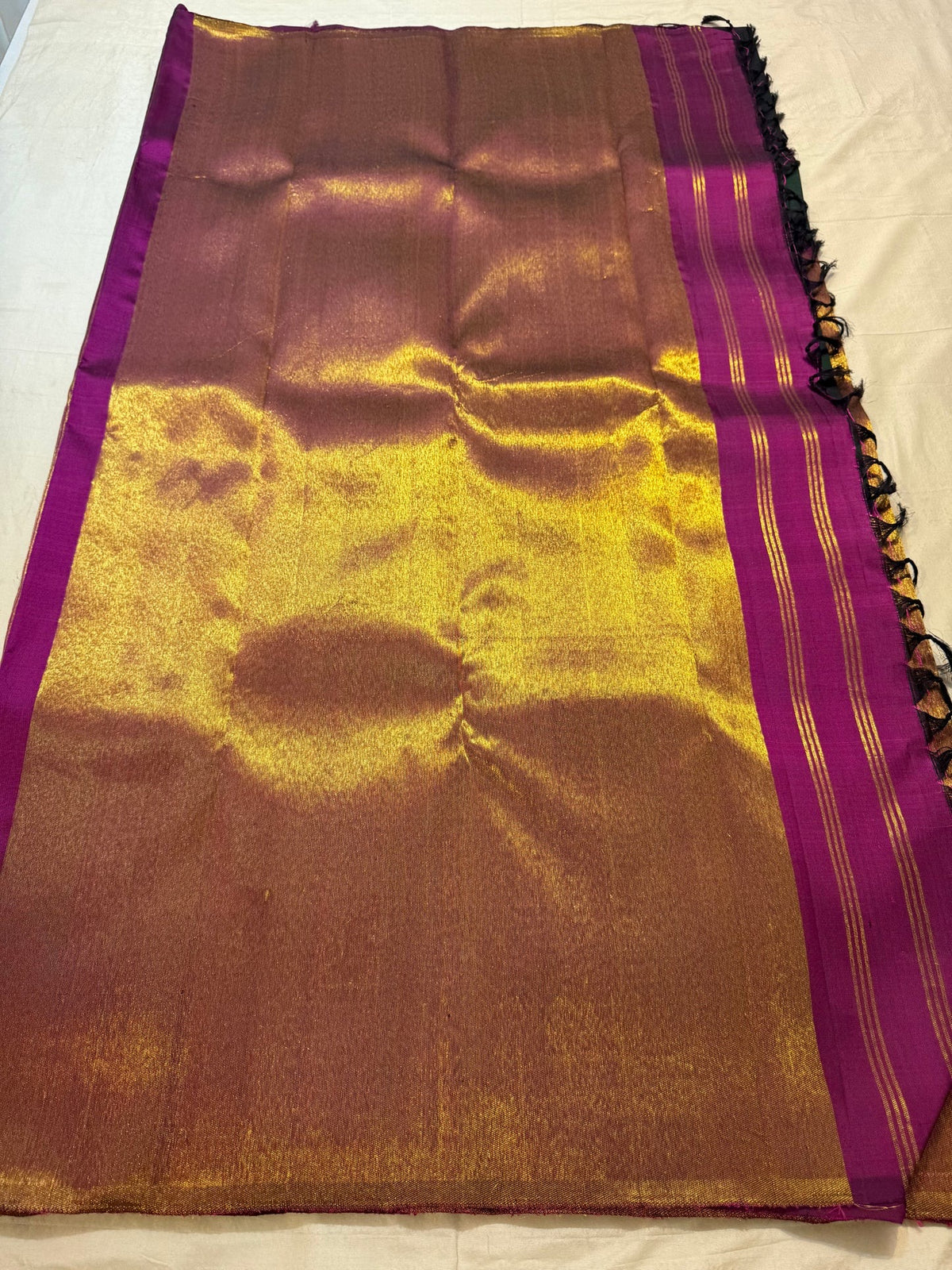 Deep bottle green Kancheepuram silk saree with Ettukol zari border and pallu