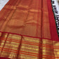 Handwoven Pure Silk Kanchipuram saree with Varisaipet construction and warm gold zari detailing.