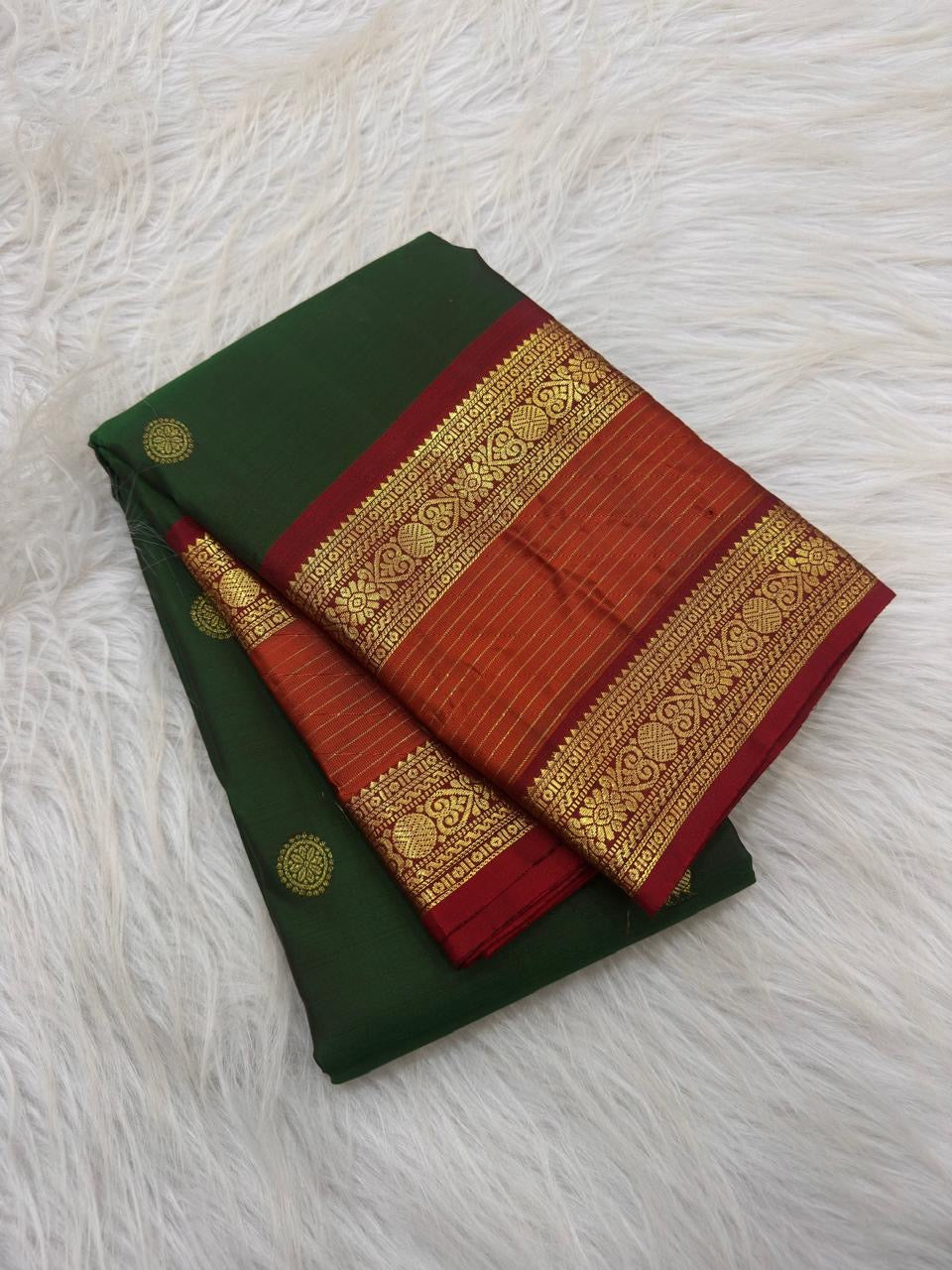 Handwoven Pure Silk Kanchipuram saree with Rettapet construction and warm gold zari detailing.