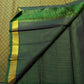 Handwoven Kili parrot zari motif on a Deep Forest Green Kanjivaram saree.
