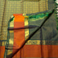 Folded view of bottle green and cinnamon terracotta vairaoosi Kanchipuram silk saree — Idam Living