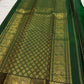 Deep Emerald Green pure silk Kanjivaram Butta saree with Arakku Red finishing edge.