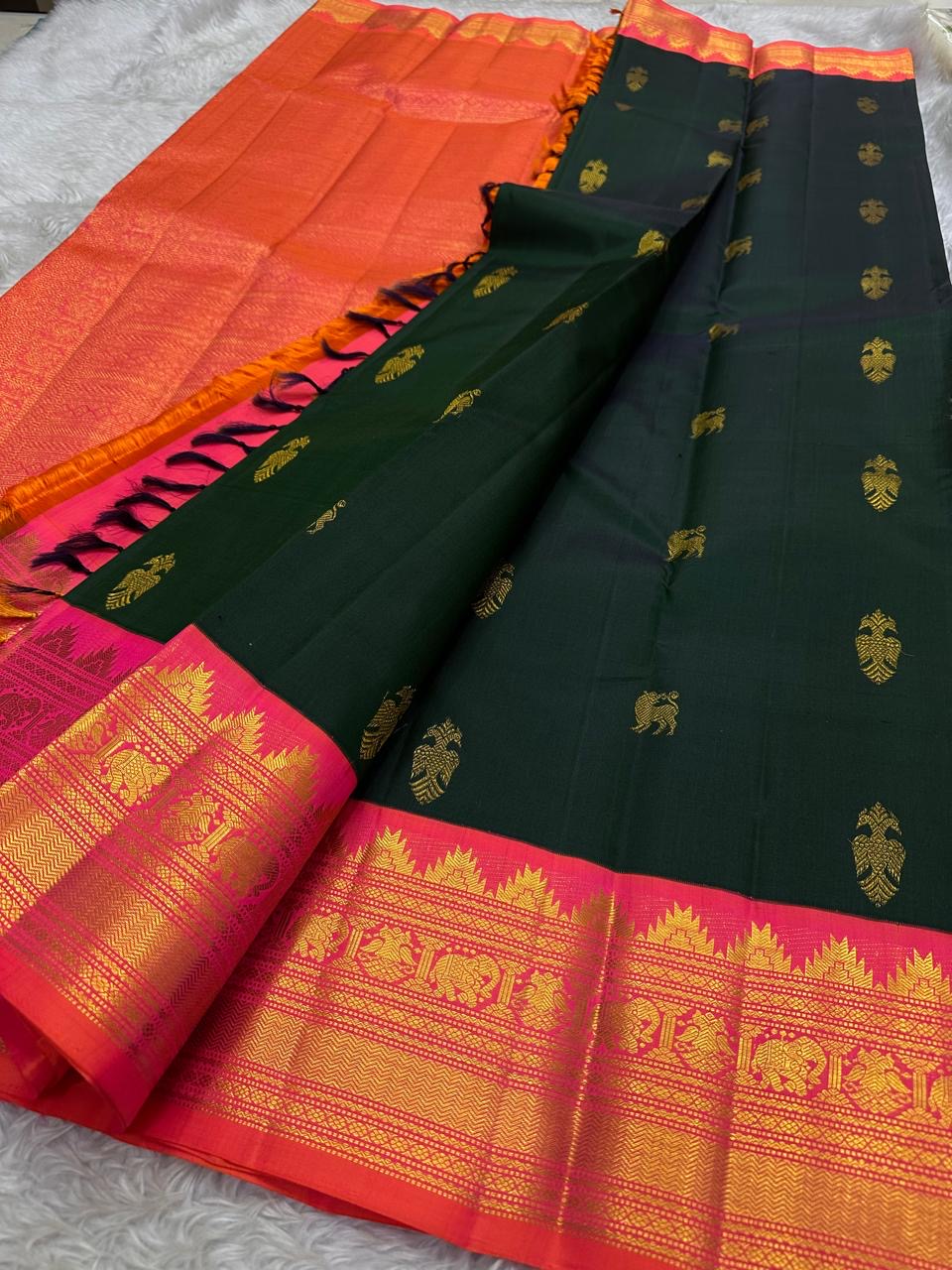 Deep Forest Green Handwoven Pure Silk Kanjeevaram Saree with Gandaberunda Zari Buttas and Rani Pink Border