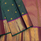 Deep Green Pure Silk Kanchipuram Zari Kattam saree with Magenta border and rich contrast pallu