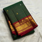 Deep Forest Green Kanchipuram silk saree with fine intersecting zari Kattam grid.