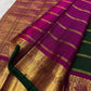 Dark green edging framing the Rani-Magenta and antique-gold zari border of the Kanchipuram saree — Idam Living