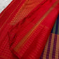 Deep indigo and vermilion Pure Silk Kanchipuram saree with fine zari stripes