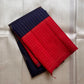 Double-shade orange vermilion shot colour pallu on a Pure Silk Kanchipuram saree