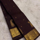 Deep Kanchana Brown pure silk Kanjivaram Butta saree with handwoven zari paisley buttas