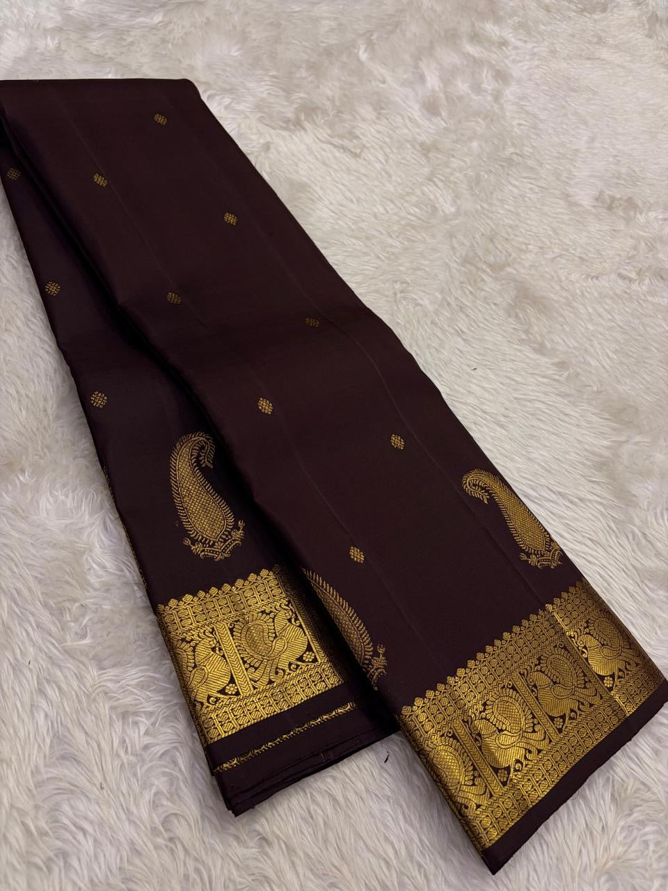 Deep Kanchana Brown pure silk Kanjivaram Butta saree with handwoven zari paisley buttas