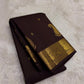 Intricate warm-gold Mayil zari border on Deep Kanchana Brown Kanjivaram saree