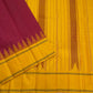 Deep arakku red Kancheepuram silk saree Pattupet body close-up showing plain silk weave without zari
