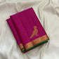 Handwoven deep magenta Kanchi Pattu pure silk saree with fine Vairaoosi zari shimmer body and contrast forest green border
