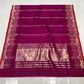 Deep magenta Katan Silk Chanderi saree body close-up showing dashed gold pinstripes