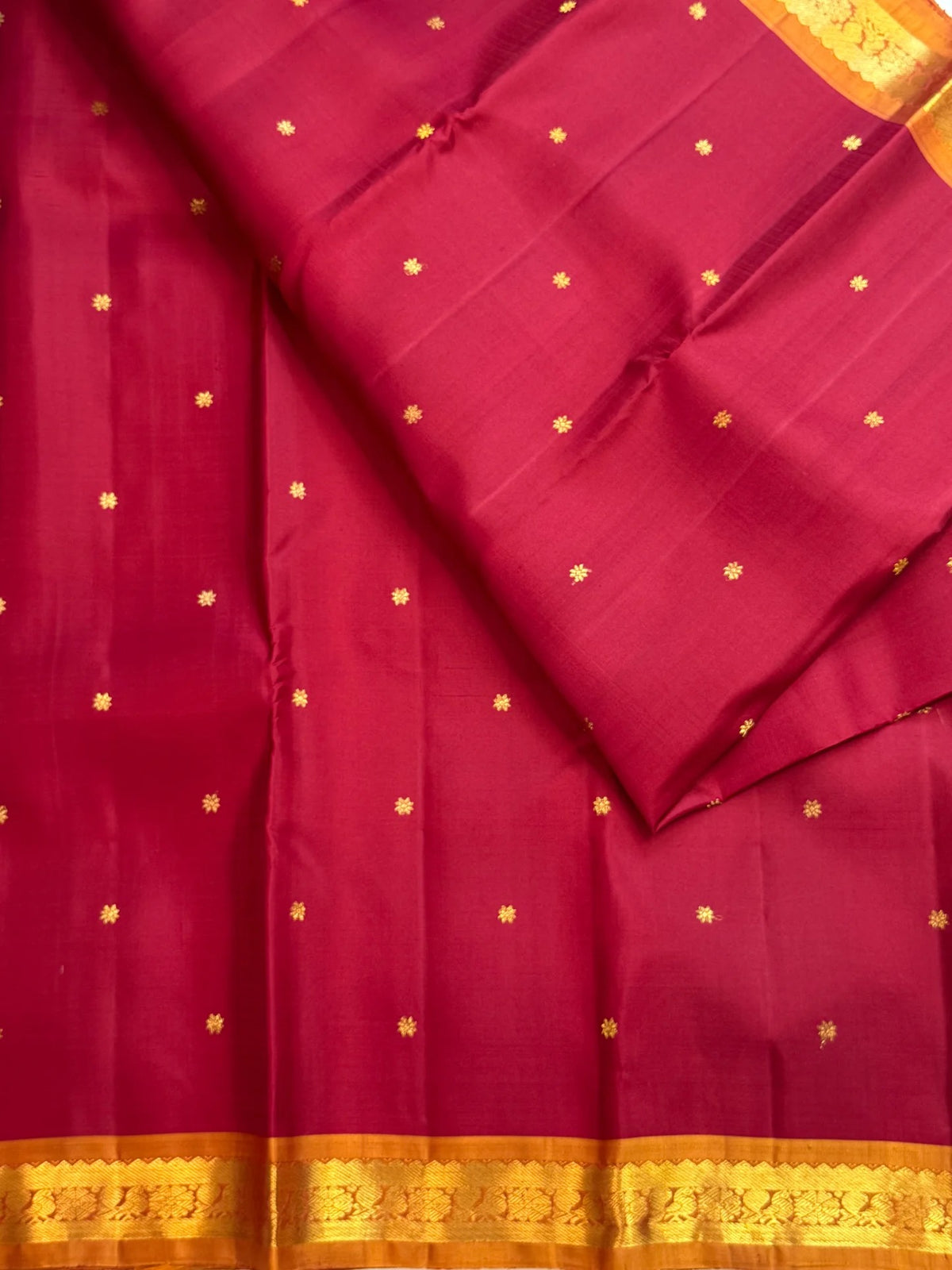 Deep magenta red Pure Silk Kanjivaram Butta saree with copper gold zari border, detail view 3