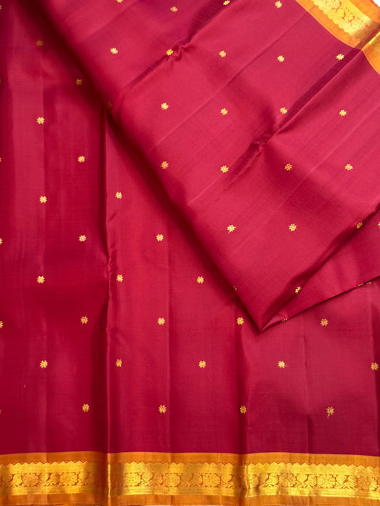 Deep magenta red Pure Silk Kanjivaram Butta saree with copper gold zari border, detail view 3