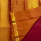 Deep magenta red Pure Silk Kanjivaram Butta saree with copper gold zari border, detail view 2