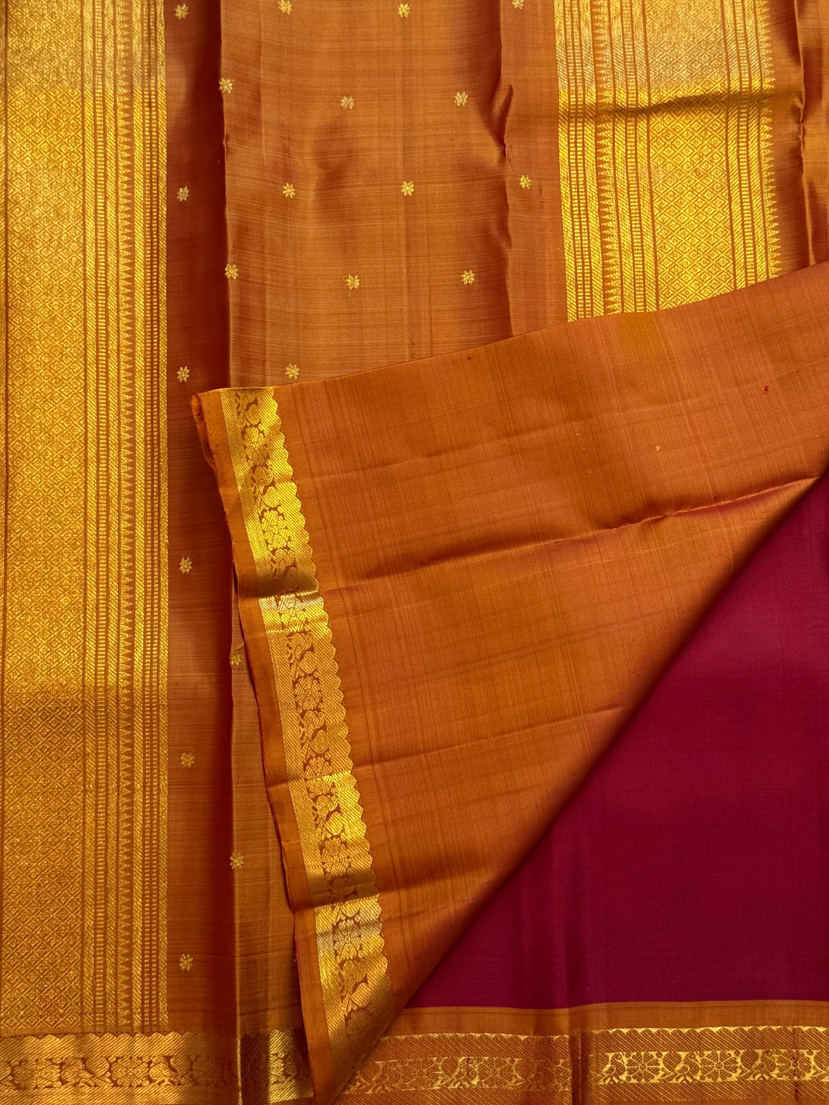 Deep magenta red Pure Silk Kanjivaram Butta saree with copper gold zari border, detail view 2