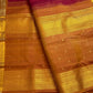 Deep magenta red Pure Silk Kanjivaram Butta saree with copper gold zari border