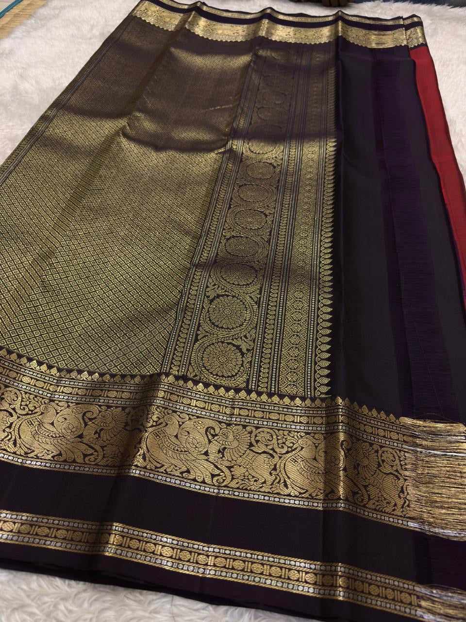 Arakku Red and Deep Maroon Handwoven Pure Silk Kanjeevaram Saree with Mayil Butta and Vanasringaram Silk Thread Border