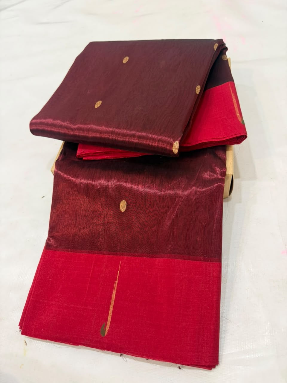 Deep maroon Chanderi saree with small gold zari dots