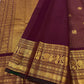Deep maroon Kanjeevaram saree with Mayil pallu