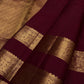 Deep red Kanjeevaram saree with gold zari pallu