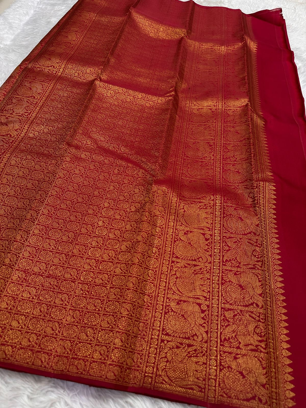Pallu detail with Gaja-Yali motifs on Deep Maroon Kanjivaram silk saree