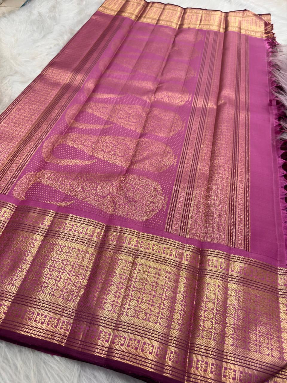 Deep Maroon Kanchipuram Butta saree with geometric gold zari Jaal border