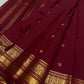 Deep Maroon Kanchipuram silk saree with dense Poo-Kodi traditional gold zari weaving