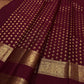 Deep maroon Kanjivaram saree with traditional zari border
