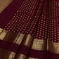 Deep maroon Kanjivaram saree with rich zari border