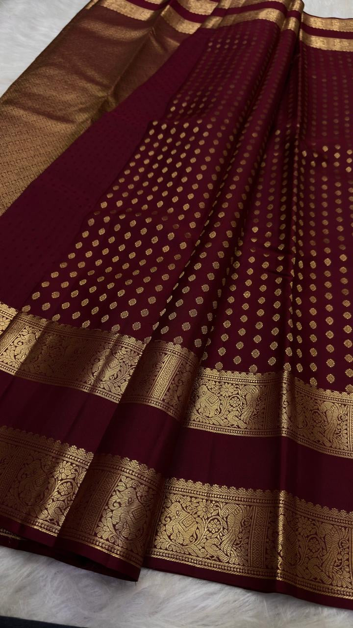 Deep maroon Kanjivaram saree with rich zari border