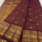 Deep maroon Kanjivaram saree with ornate gold border
