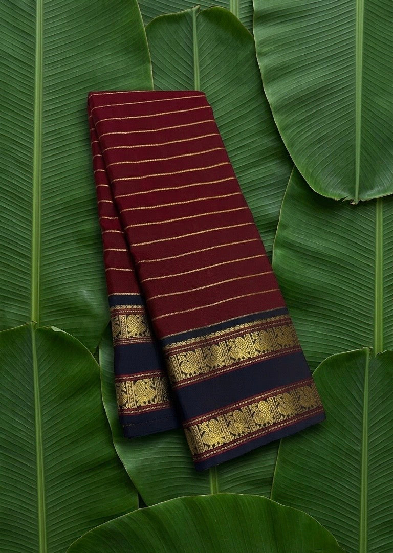 Deep maroon and navy blue handwoven Kanchipuram pure silk saree with seepu reku body and rettapet border — Idam Living