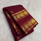 Deep maroon pure silk Kanchipuram Rettapet saree, draped front view