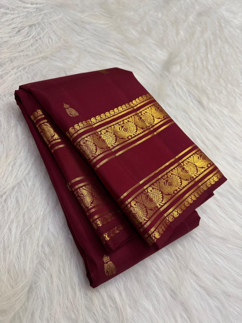 Deep maroon pure silk Kanchipuram Rettapet saree, draped front view